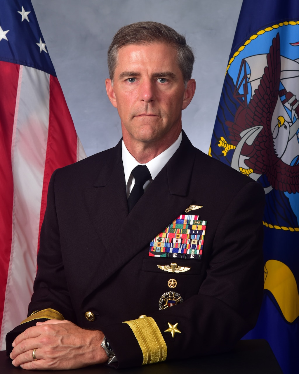 Official studio photo of Rear Adm. Marc Miguez, Commander, Carrier Strike Group 2