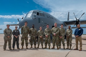 U.S. Air Force Academy cadets pose in front of a C-130 Hercules aircraft during Operation Air Force, at Dyess Air Force Base, Texas, June 9, 2022.  In addition to visiting Dyess AFB, the cadets ventured out to Goodfellow AFB and Lackland AFB to further their understanding of the operational Air Force prior to commissioning. (U.S. Air Force photo by Senior Airman Josiah Brown)