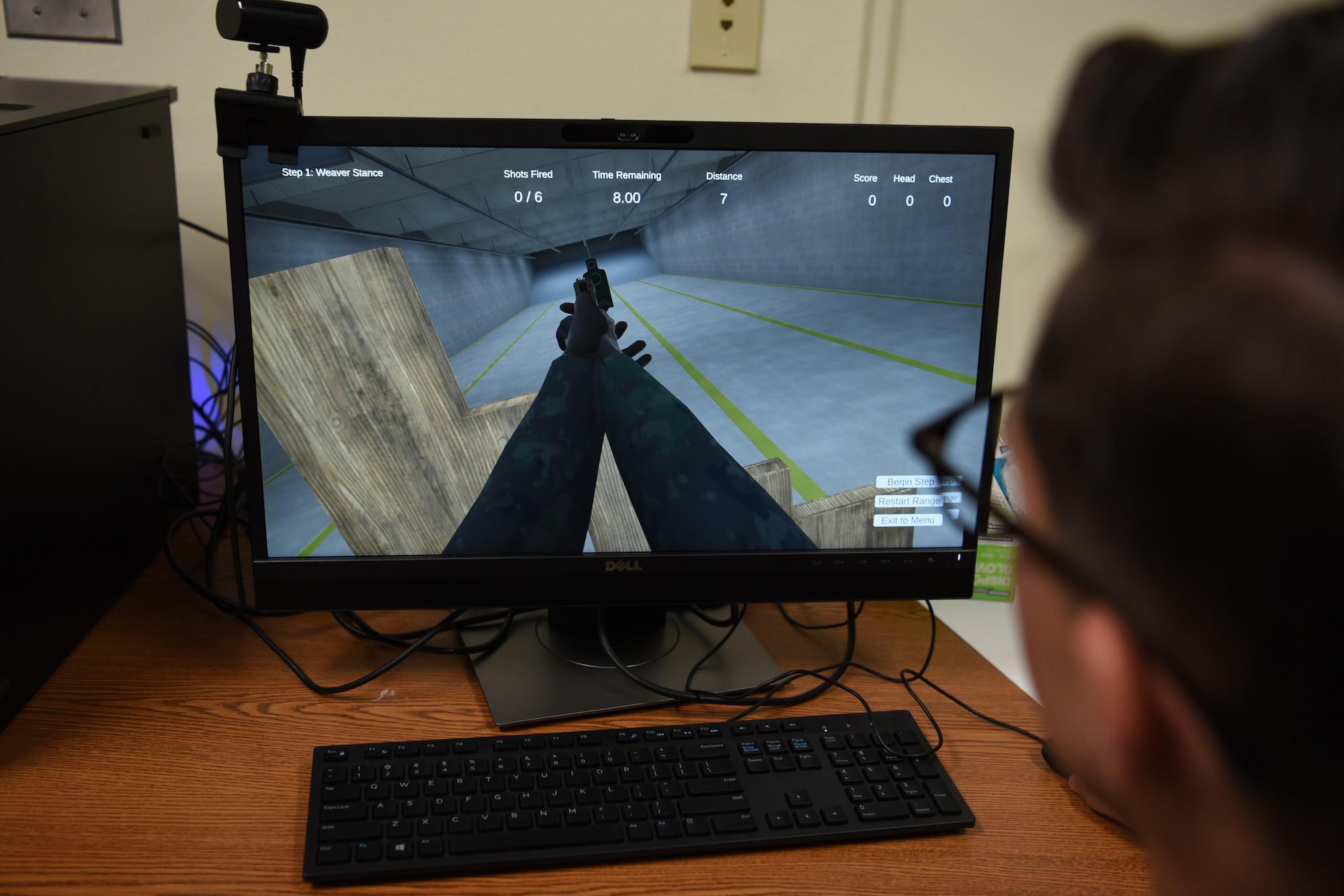 U.S. Air Force Staff Sgt. Mackenzie Simpson, 17th Security Forces Squadron trainer, operates a virtual reality simulator for five visiting U.S. Air Force Academy cadets at Goodfellow Air Force Base, Texas, June 13, 2022. The immersion allows opportunities like to reinforce the Air Force’s commitment to advance force development by offering new experiences, mentorship, and training. (U.S. Air Force photo by Senior Airman Abbey Rieves)