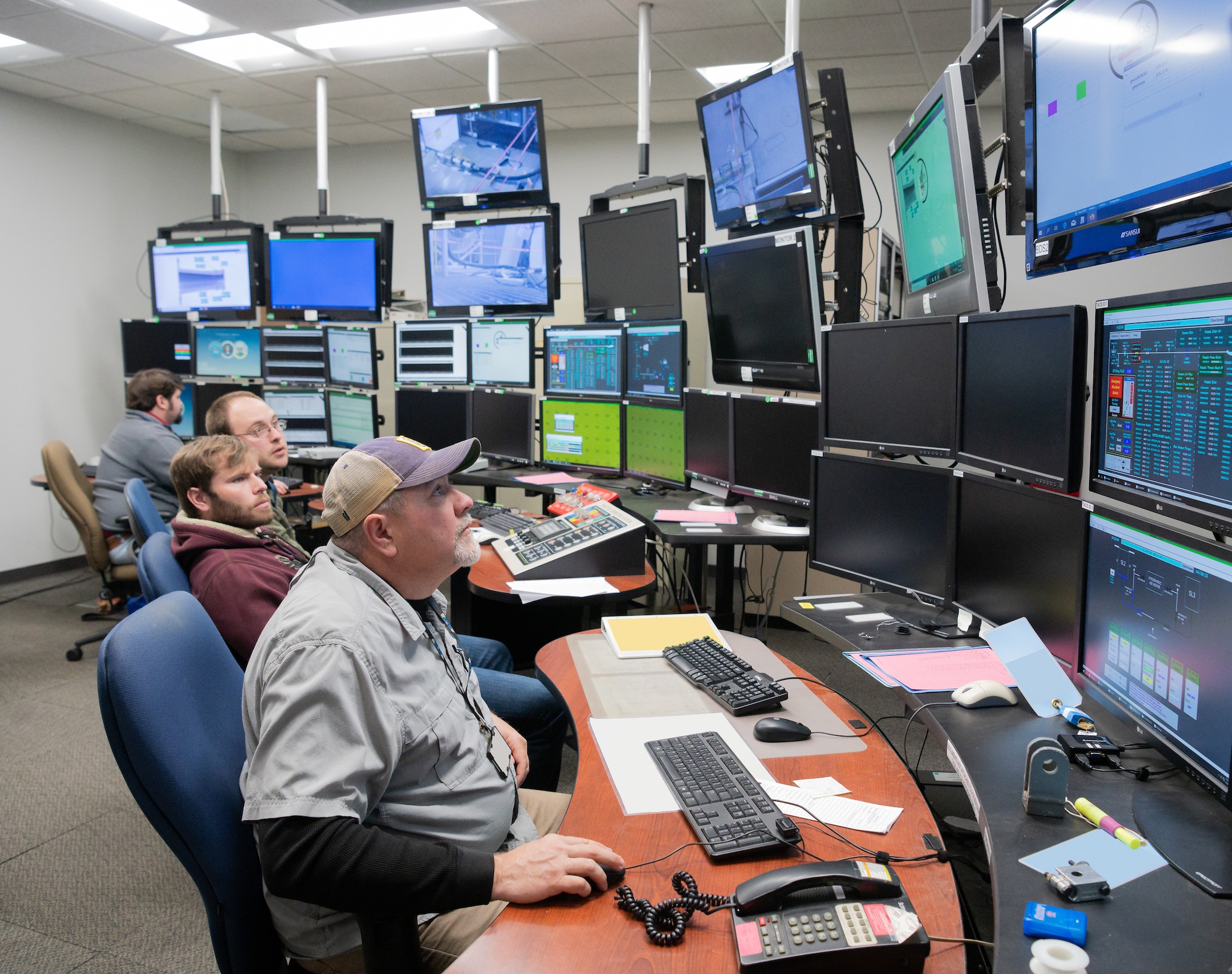 From left, Haley Goldston, a research assistant with the University of Tennessee Space Institute (UTSI); Dr. Phil Kreth, an assistant professor with UTSI; and Justin Thomas, a test engineer with the 717th Test Squadron, 804th Test Group, Arnold Engineering Development Complex, look at shadowgraph data during an experiment in SL-2.