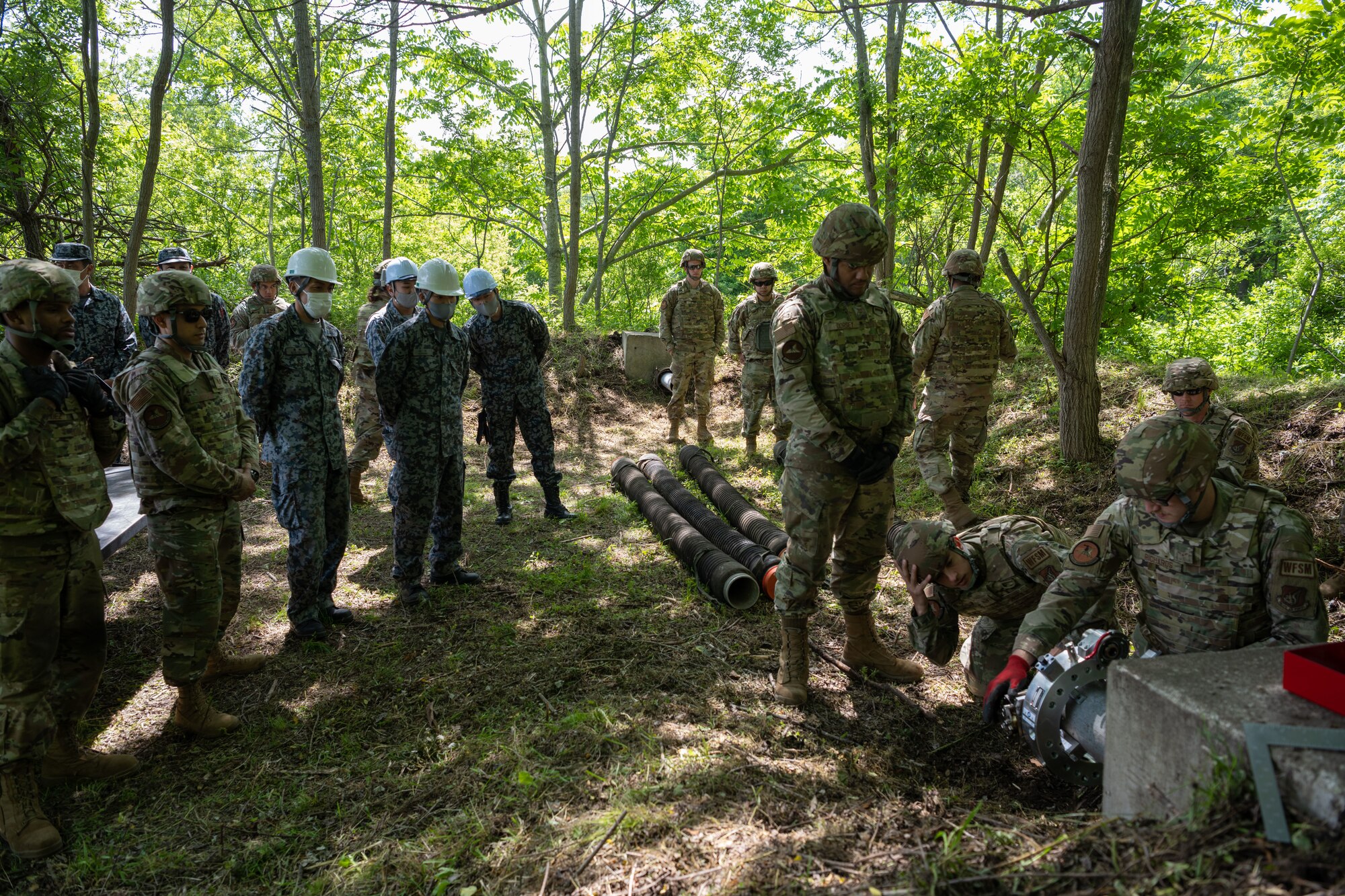 U.S. Airman 1st Class Phillip Richards, 35th Civil Engineer Squadron water and fuel system journeyman, demonstrates the set up of the Water and Fuel Expedient Repair System (WaFERS) during the annual Prime Base Engineer Emergency Force (Prime BEEF) at Misawa Air Base, Japan, June 14, 2022.