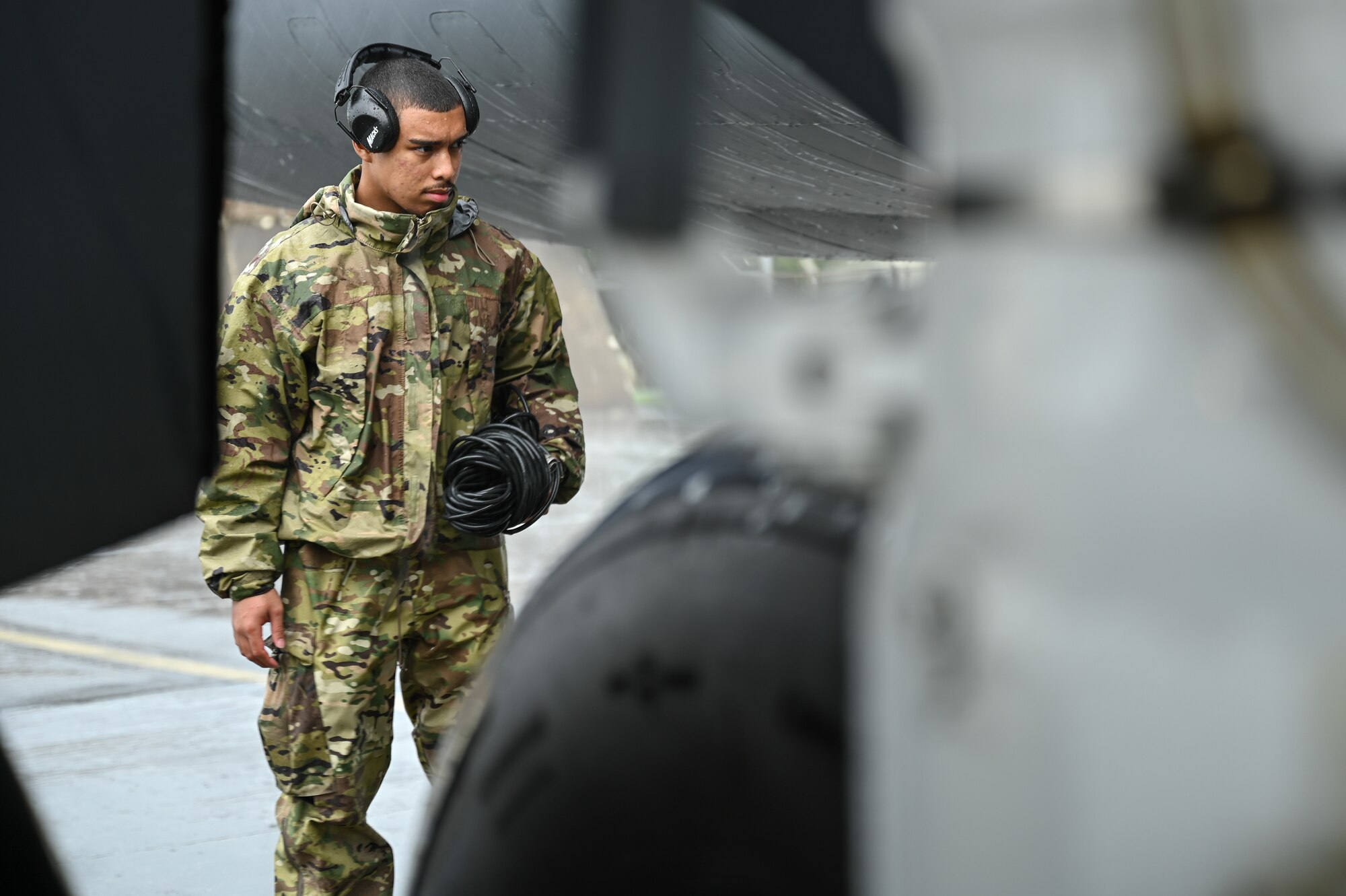 Photo of Airman conducting pre-flight checks.