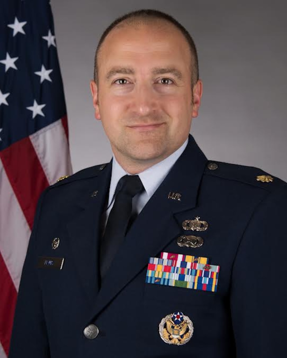Major Justin Lewis, Commander 