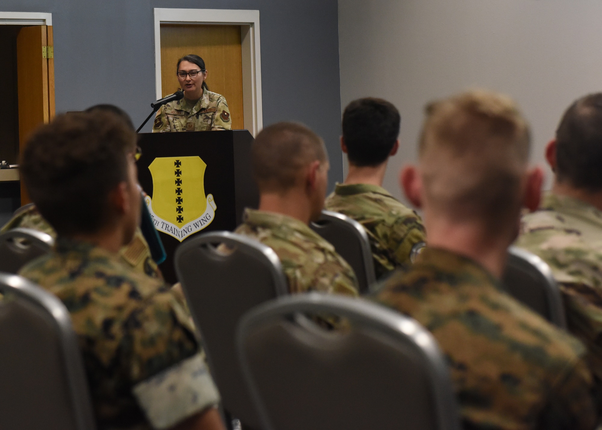 U.S. Air Force Tech. Sgt. Alexandria Holder, 517th Training Group global language mentor, speaks during the Pride Month Kickoff and Leadership Panel at Goodfellow Air Force Base, Texas, June 6, 2022. Holder spoke about her journey as a transgender female serving in the military and how the ‘Don’t Ask, Don’t Tell’ ban affected her. (U.S. Air Force photo by Airman 1st Class Zachary Heimbuch)