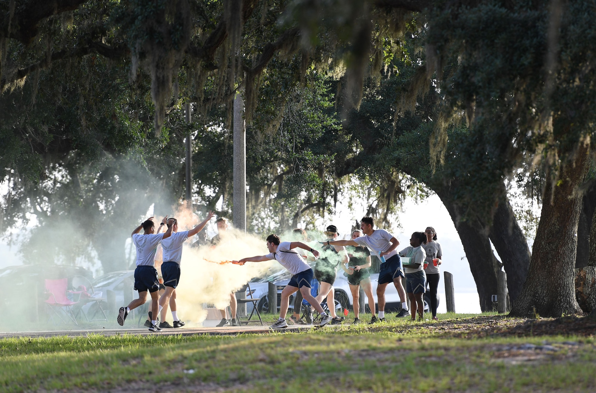 Keesler personnel participate in the Suicide Prevention Color Run at marina park at Keesler Air Force Base, Mississippi, June 16, 2022. More than 250 runners and 70 volunteers participated in the Air Force Sergeants Association Chapter 652 hosted event. (U.S. Air Force photo by Kemberly Groue)