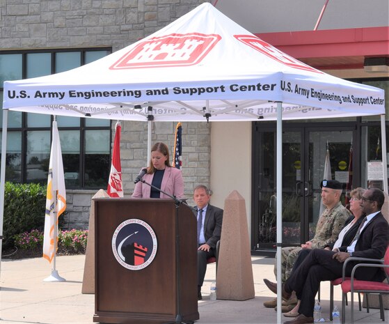 Amy L. Borman, deputy assistant secretary of the Army for Environment, Safety and Occupational Health, offers her congratulations and presents the Safety and Occupational Health Star flag to Huntsville Center. (Photo by Elizabeth Canfil)