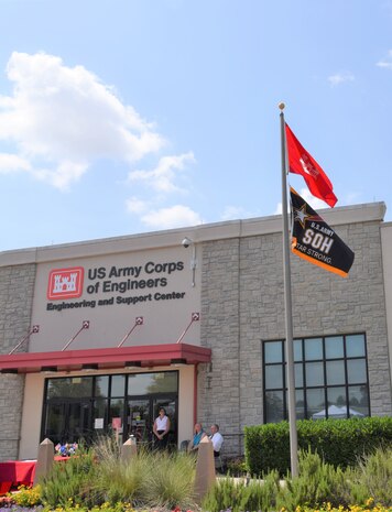The U.S. Army Engineering Center, Huntsville proudly displays the Army's Safety and Occupational Health Star flag following an award ceremony June 15. (Photo by Elizabeth Canfil)