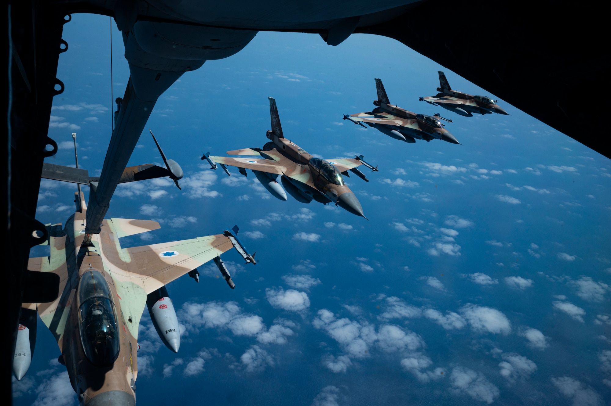 A U.S. Air Force KC-10 Extender assigned to the 908th Expeditionary Air Refueling Squadron, performs aerial refueling operations with an Israel Defense Forces F-16 Barak aircraft within the Ninth Air Force (Air Forces Central) area of responsibility, May 18, 2022.