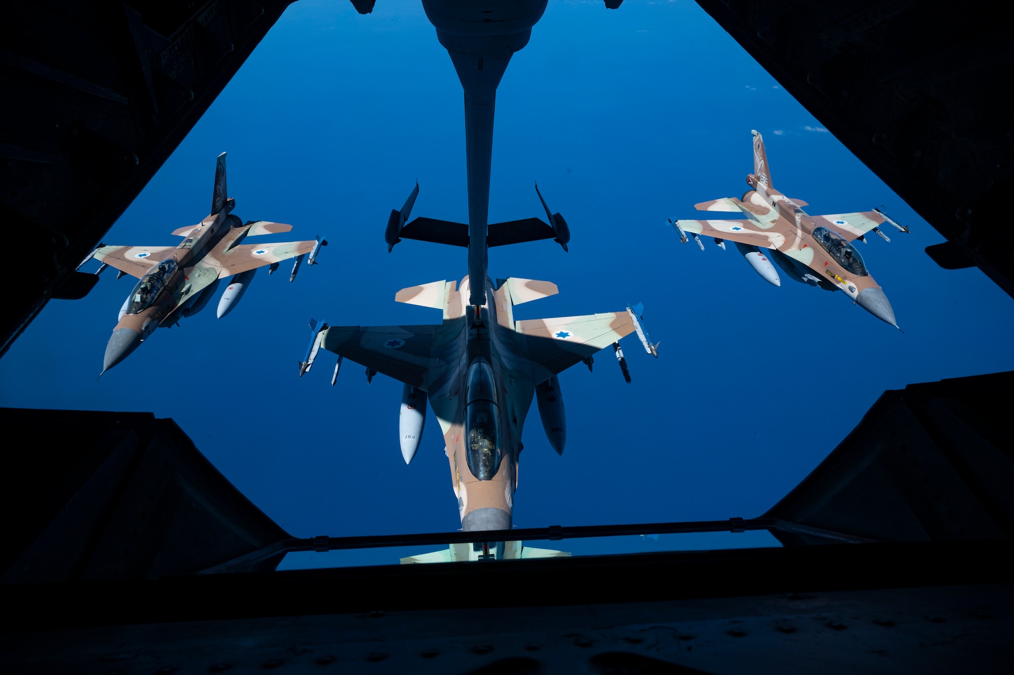 A U.S. Air Force KC-10 Extender assigned to the 908th Expeditionary Air Refueling Squadron, performs aerial refueling operations with an Israel Defense Forces F-16 Barak aircraft within the Ninth Air Force (Air Forces Central) area of responsibility, May 18, 2022.