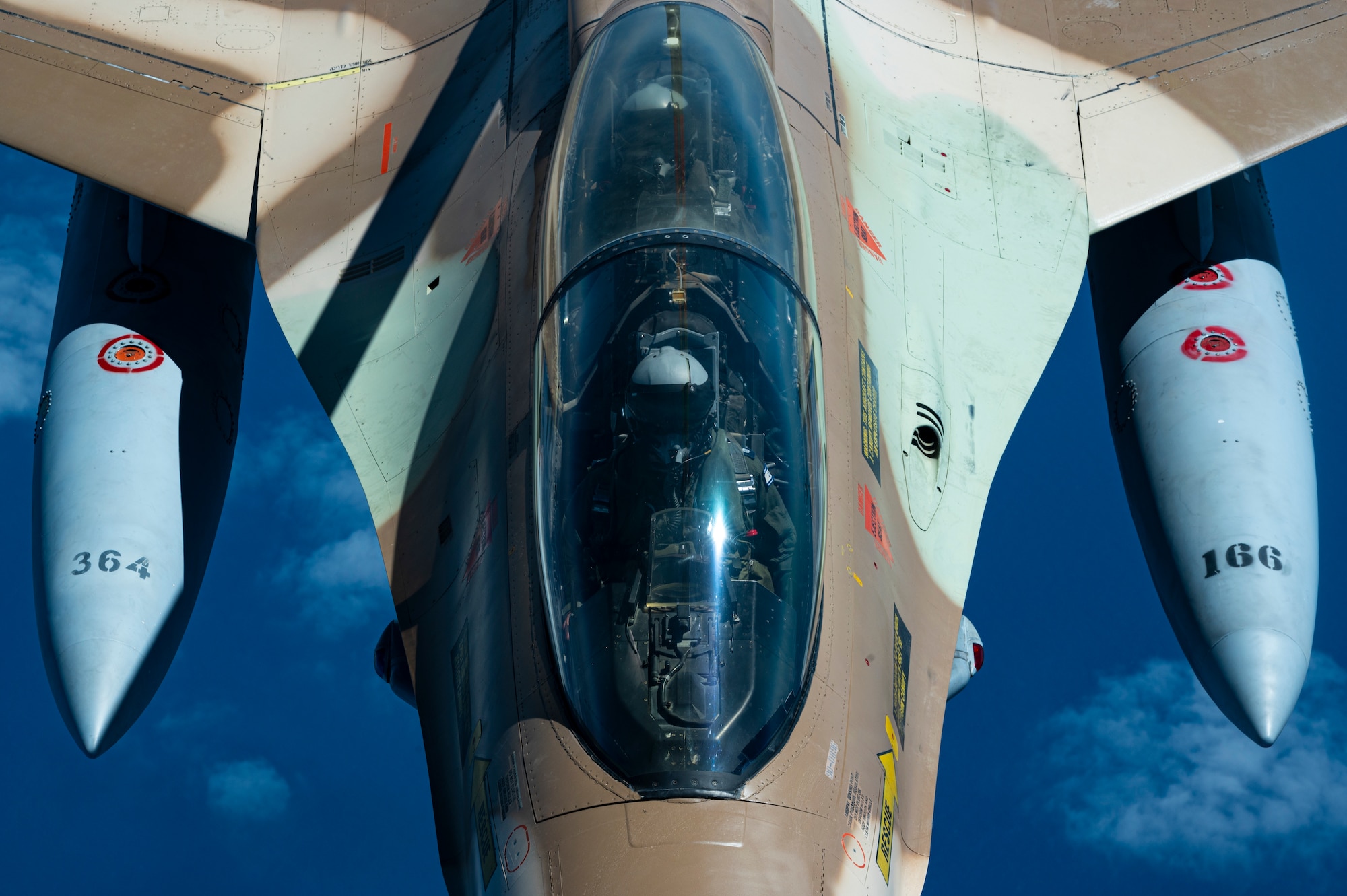 A U.S. Air Force KC-10 Extender assigned to the 908th Expeditionary Air Refueling Squadron, performs aerial refueling operations with an Israel Defense Forces F-16 Barak aircraft within the Ninth Air Force (Air Forces Central) area of responsibility, May 18, 2022.