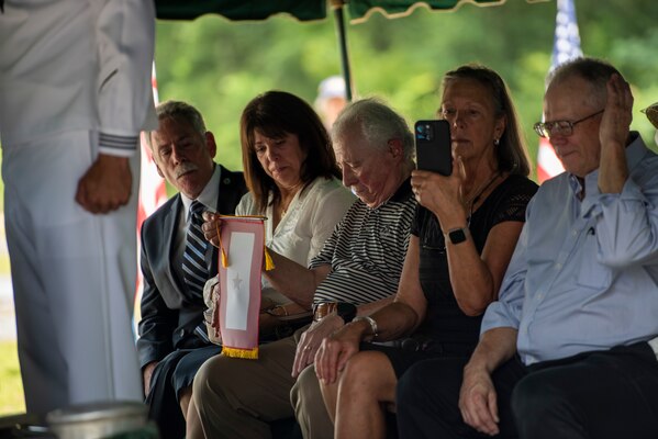 Seaman Second Class Tceollyar Simmons memorial service. On November 19, 2021, the Defense POW/MIA Accounting Agency (DPAA) identified the remains of Seaman Second Class Tceollyar, missing from World War II.
