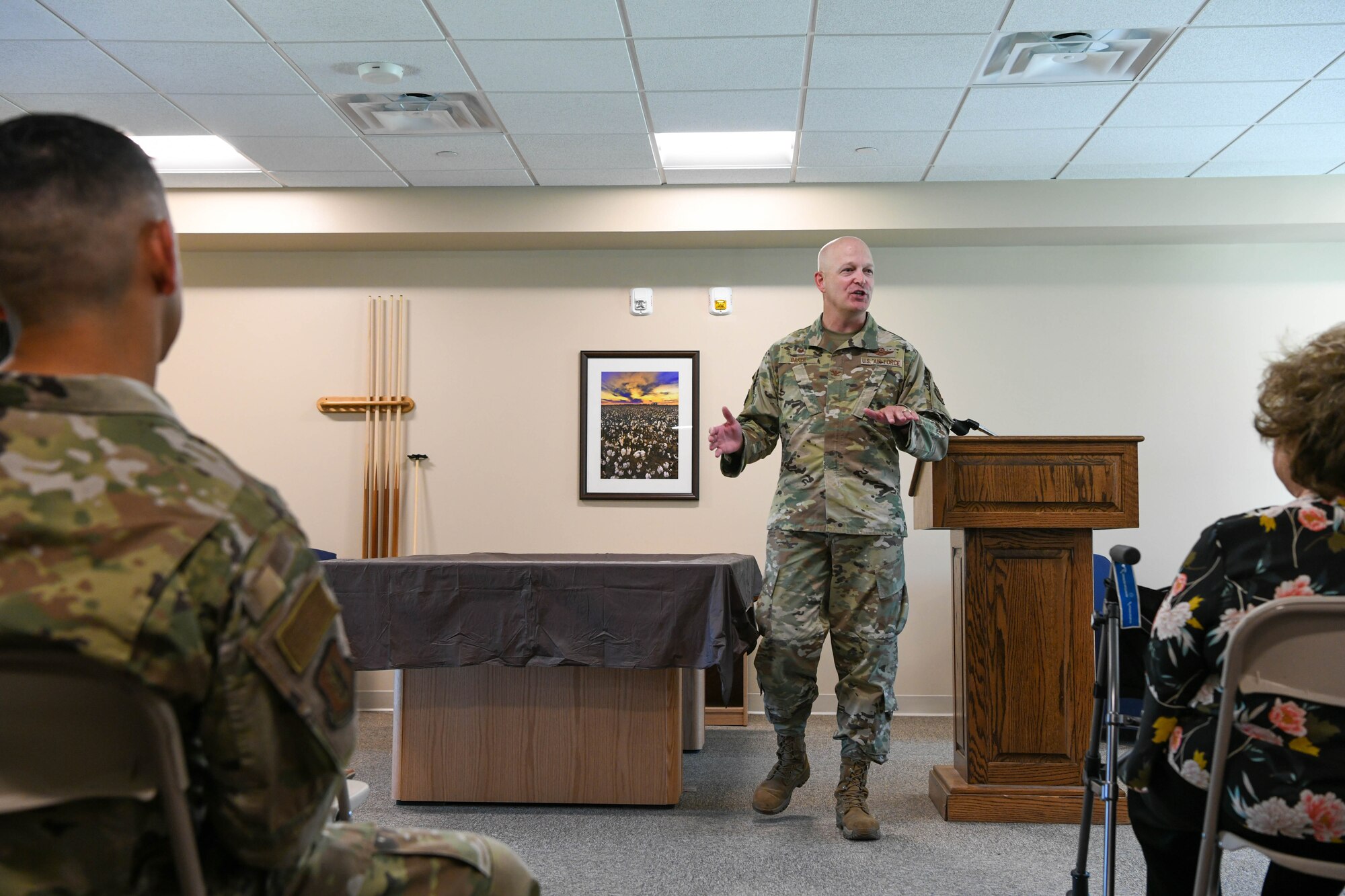 U.S. Air Force Col. Blaine Baker, 97th Air Mobility Wing commander, addresses Airmen and members of the Altus Air Force Base, Oklahoma, (AAFB) community at a ribbing cutting ceremony for the new dormitory, June 13, 2022. Base leaders initially broke ground on the new dorm in November of 2019. (U.S. Air Force photo by Airman 1st Class Trenton Jancze)