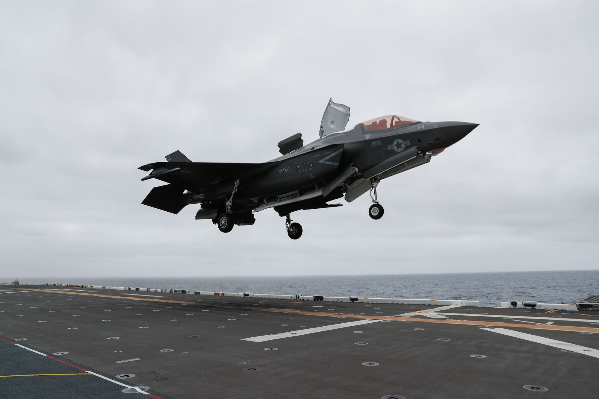 An F-35B Lightning II aircraft attached to Marine Operational Test and Evaluation Squadron (VMX) 1 lands aboard amphibious assault ship USS Tripoli (LHA 7), Mar. 31. VMX-1 is embarked aboard Tripoli as part of the U.S. Marine Corps’ Lightning carrier concept demonstration. The Lightning carrier concept demonstration shows Tripoli and other amphibious assault ships are capable of operating as dedicated fixed-wing carrier platforms, capable of bringing fifth generation Short Takeoff/Vertical Landing aircraft wherever they are required. (U.S. Navy photo by Mass Communication Specialist 3rd Class Maci Sternod)