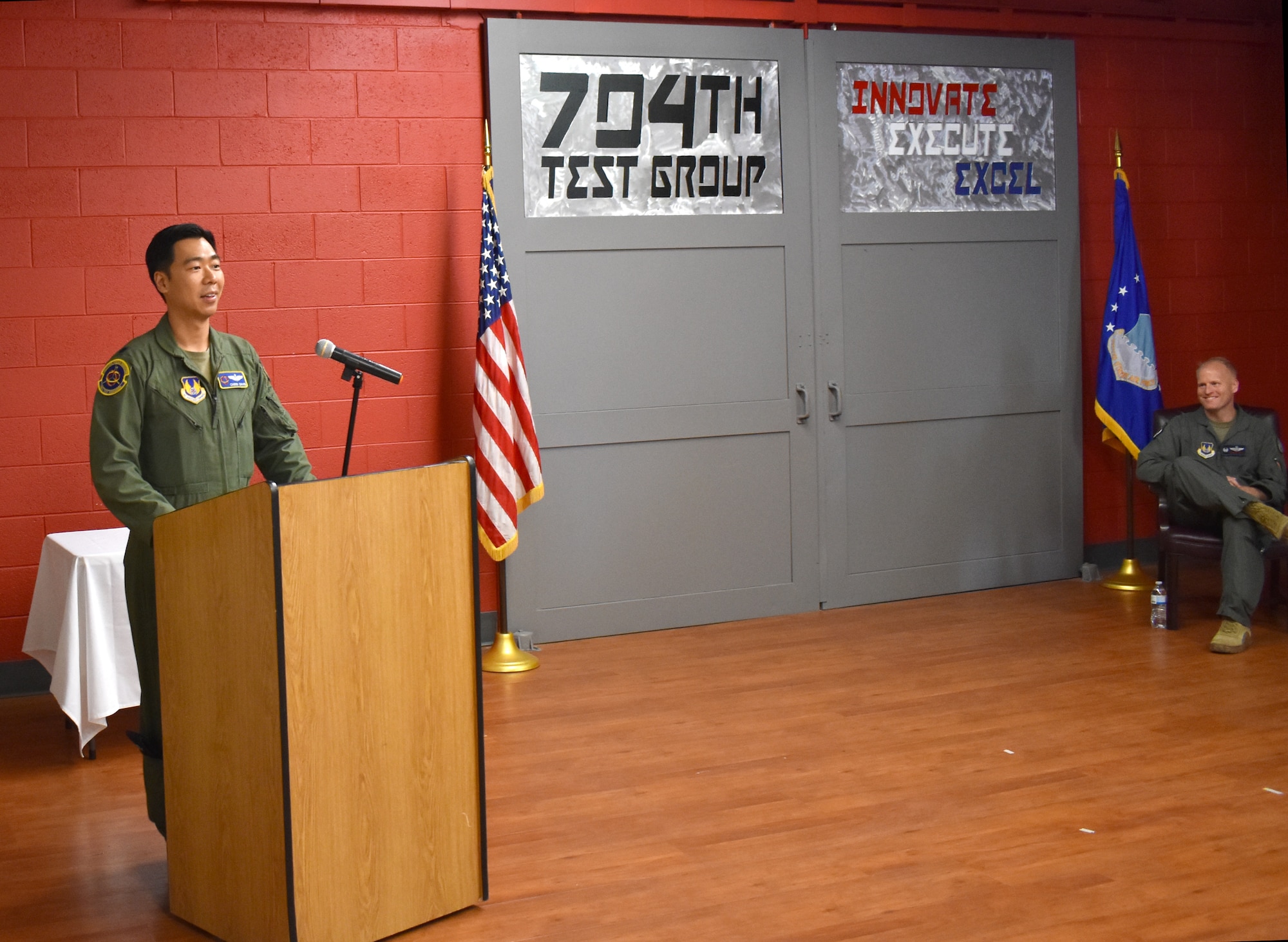 Lt. Col. Brian Davis, the new commander of the 746th Test Squadron, speaks to those in attendance at a Change of Command Ceremony at Holloman Air Force Base, New Mexico, June 8, 2022.