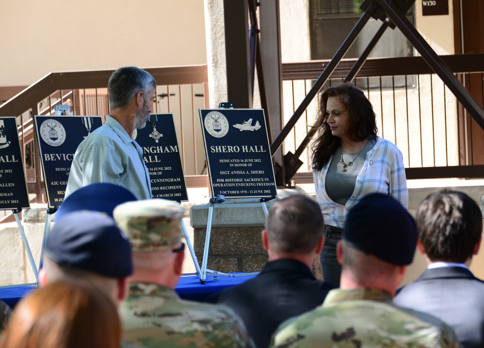 Plaque is unveiled.