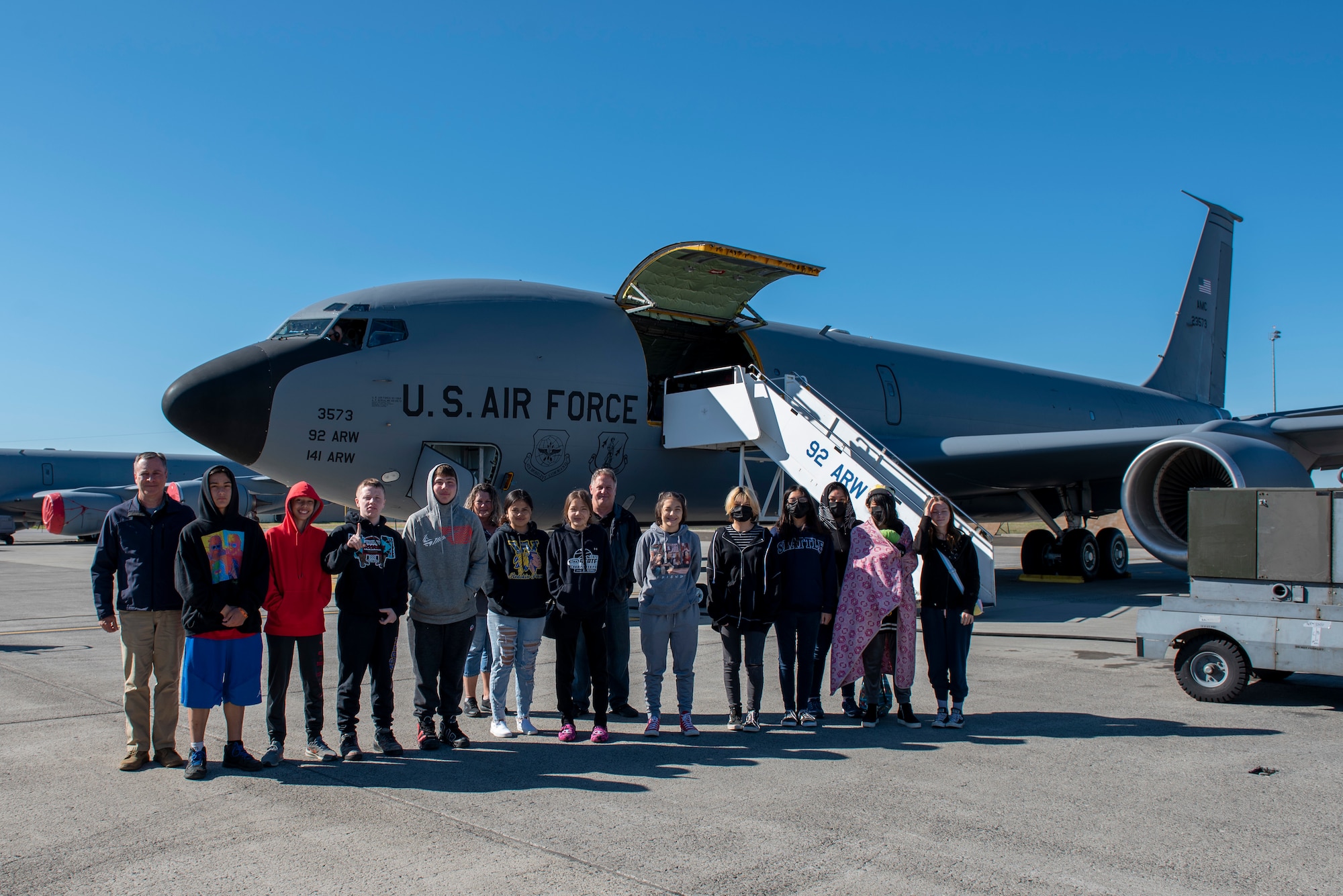 Students from Wellpinit High School pose for a photo after an orientation on a KC-135 Stratotanker at Fairchild Air Force Base, Washington, June 6, 2022. The orientation flight was part of the Aviation Inspiration Mentorship program which focuses on informing, influencing and inspiring the next generation of Air Force aviators. (U.S. Air Force courtesy photo)