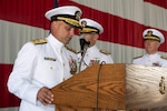 SAN DIEGO (Jun. 10, 2022) - Incoming Commander, Naval Air Force Reserve (CNAFR) Rear Adm. Brad Dunham reads his orders during the CNAFR change of command ceremony in the Fleet Logistics Support Squadron (VRC) 30 hangar at Naval Base Coronado, Jun. 10. CNAFR mans, trains and equips the Naval Air Force Reserve in order to provide enduring operational support and strategic depth to Navy forces that win in combat. (U.S. Navy photo by Mass Communication Specialist 1st Class Chelsea Milburn)