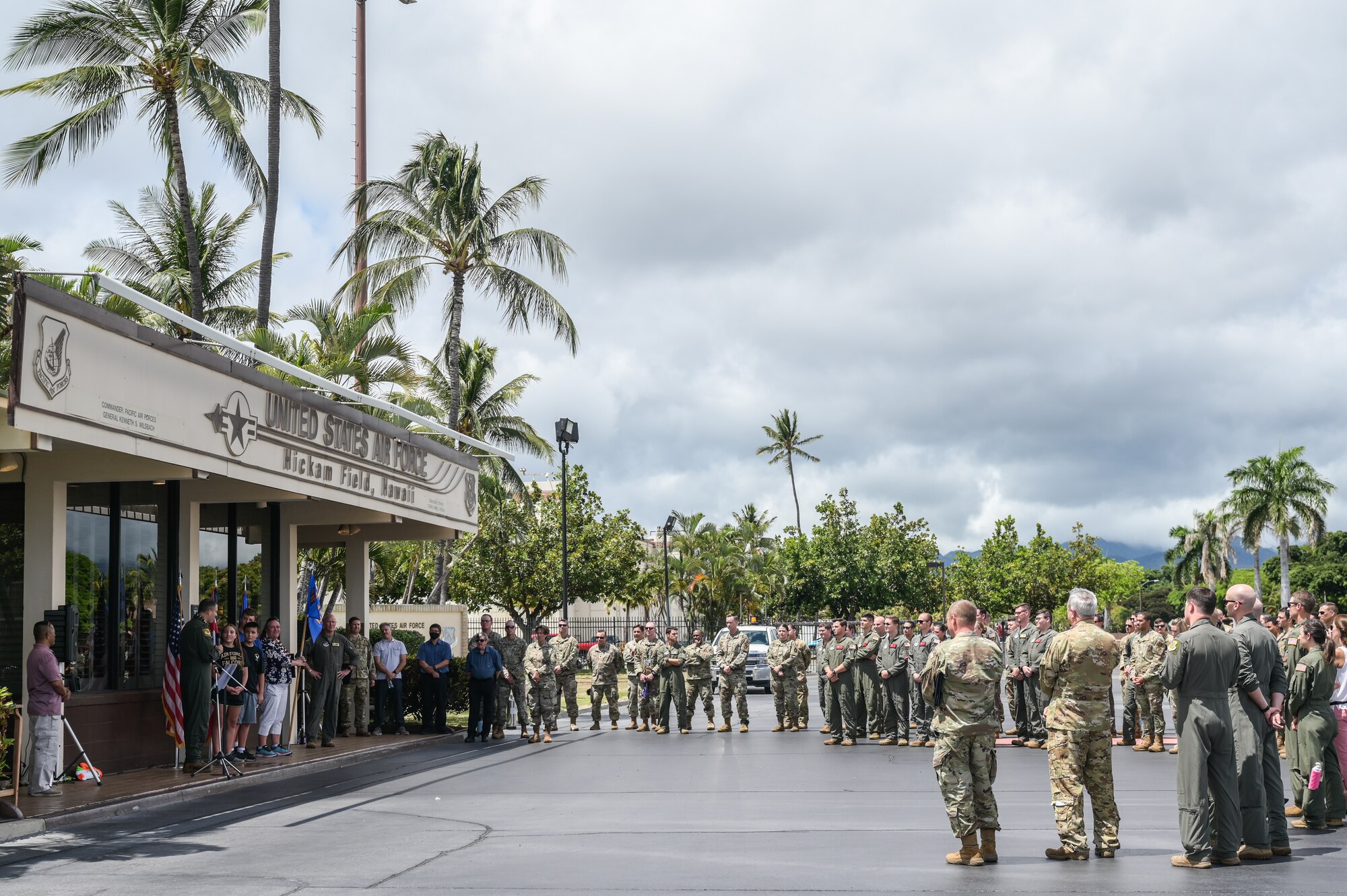 Personnel assigned to the 15th Wing celebrate with Col. Daniel Dobbels, 15th WG commander, during a retirement ceremony on Hickam Field at Joint Base Pearl Harbor-Hickam, Hawaii, June 15, 2022. After 24 years of service in the Air Force, Dobbels has recorded more than 3,200 flight hours in the C-17 Globemaster III, C-12 Huron, T-1 Jayhawk and T-37 Tweet aircraft. (U.S. Air Force photo by Staff Sgt. Alan Ricker)
