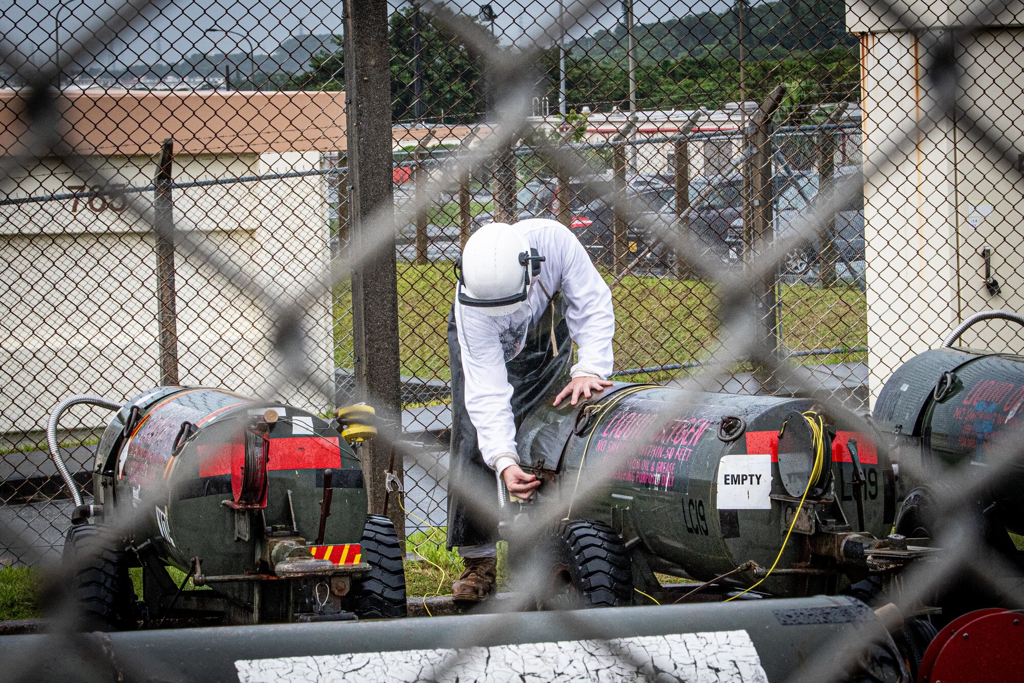 An Airman prepares liquid oxygen.