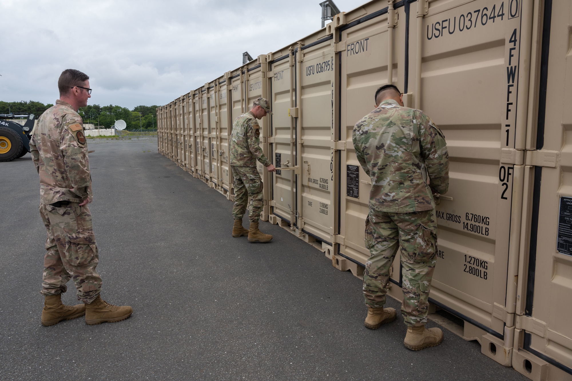 U.S. Airmen assigned to the 35th Civil Engineer Squadron water and fuel system open the Water and Fuel Expedient Repair System (WaFERS) containers for an inventory check prior to the annual Prime Base Engineer Emergency Force (Prime BEEF) at Misawa Air Base, Japan, June 13, 2022.