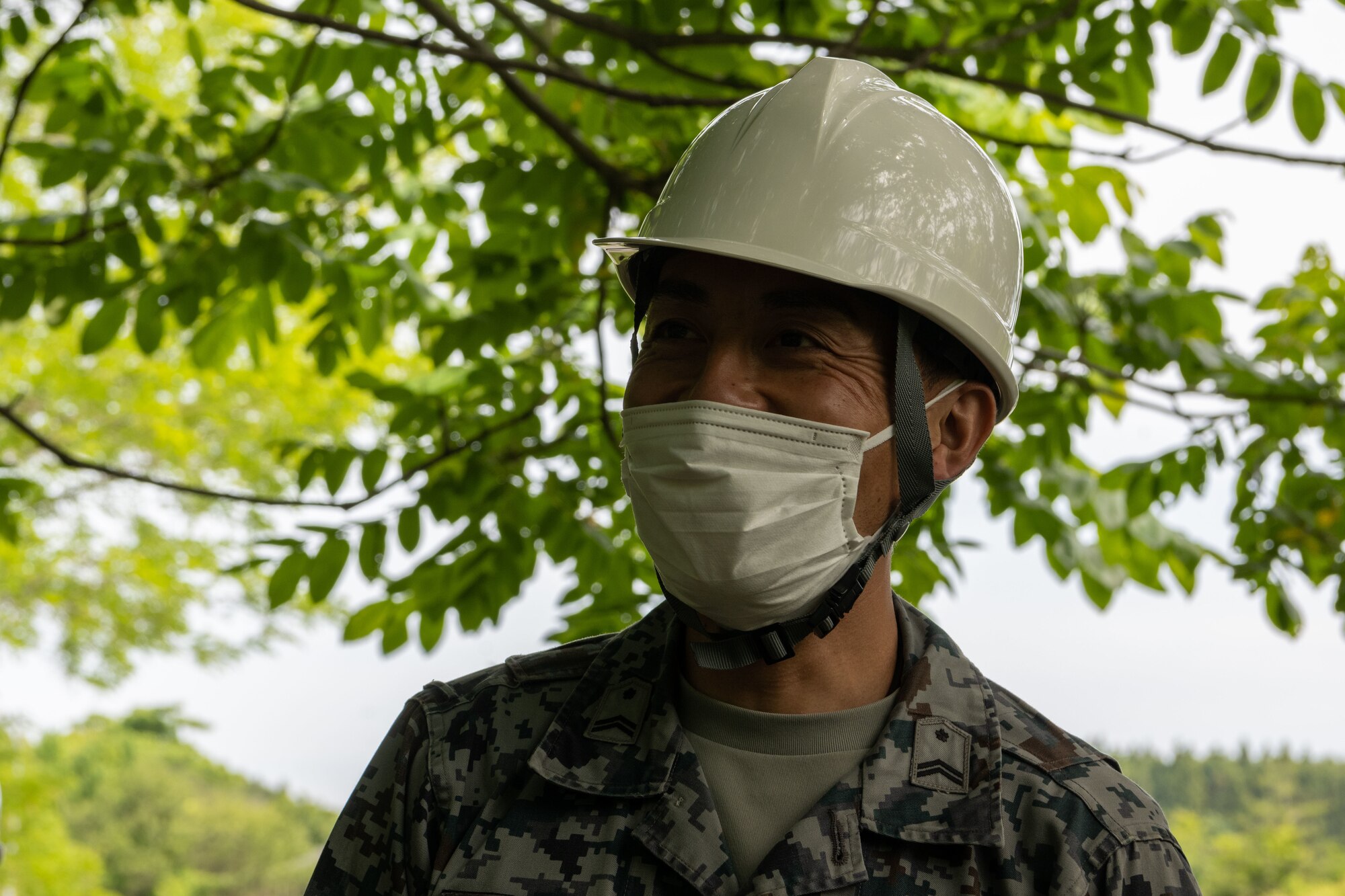 Japan Air Self-Defense Force Tech. Sgt. Akashi Kikuchi, 3rd Air Wing Civil Engineer Squadron water and fuel system maintainer, smiles after completing the fixing a simulated damaged pipe during an annual Prime Base Engineer Emergency Force (Prime BEEF) training at Misawa Air Base, Japan, June 14, 2022.