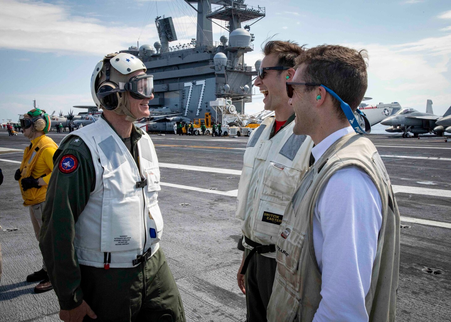 ATLANTIC OCEAN (June 9, 2022) Vice Adm. Daniel Dwyer, commander, U.S. 2nd Fleet and Joint Force Command Norfolk, meets with landing safety officers aboard the Nimitz-class aircraft carrier USS George H.W. Bush (CVN 77), June 9, 2022. The George H.W. Bush Carrier Strike Group (CSG) is underway completing a certification exercise to increase U.S. and allied interoperability and warfighting capability before a future deployment. The George H.W. Bush CSG is an integrated combat weapons system that delivers superior combat capability to deter, and if necessary, defeat America's adversaries in support of national security. Carrier Air Wing (CVW) 7 is the offensive air and strike component of CSG-10 and the George H.W. Bush CSG. (U.S. Navy photo by Mass Communication Specialist 3rd Class Brandon Roberson)