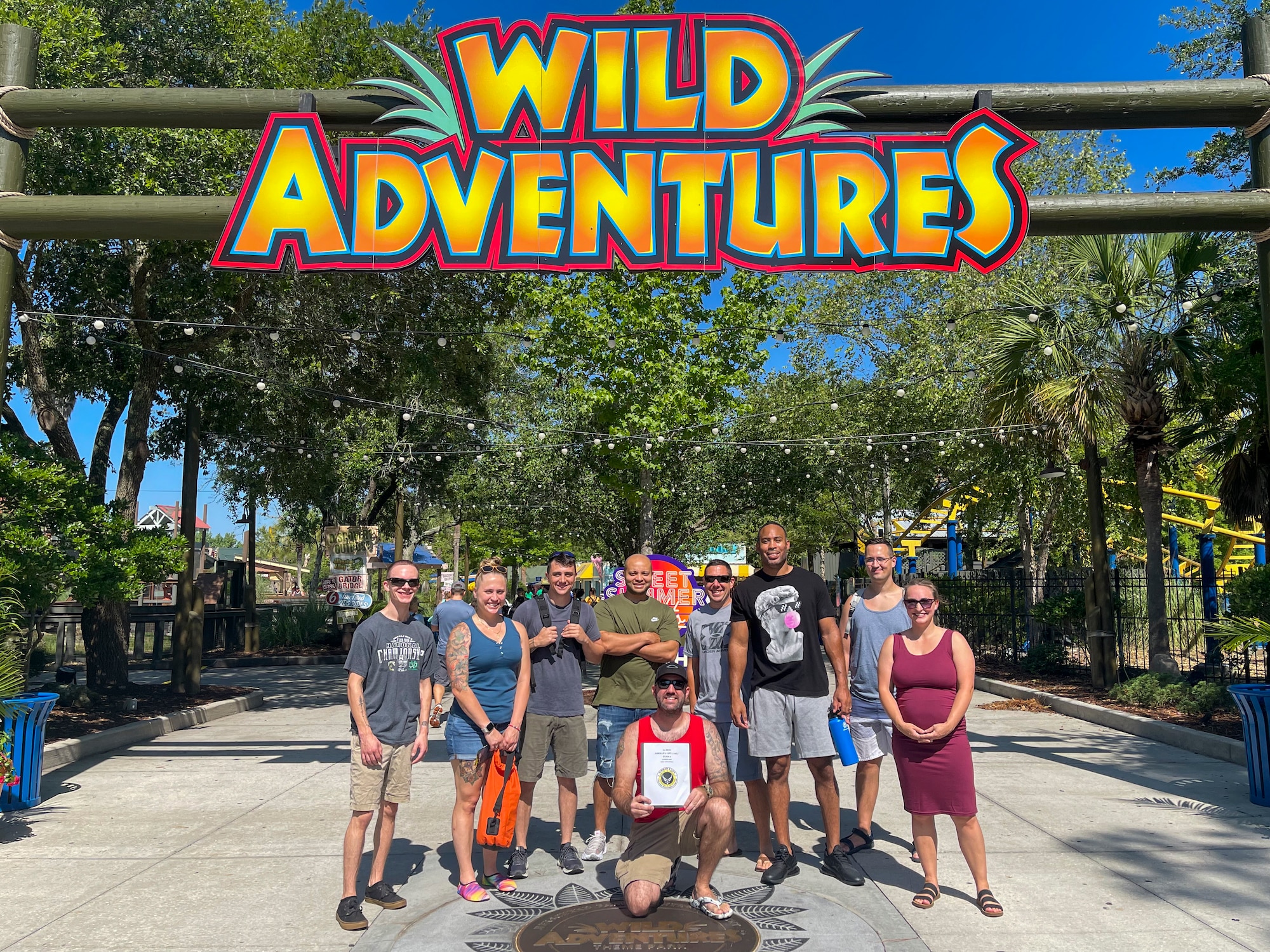 Airmen 4 Life group poses for photo at Wild Adventures