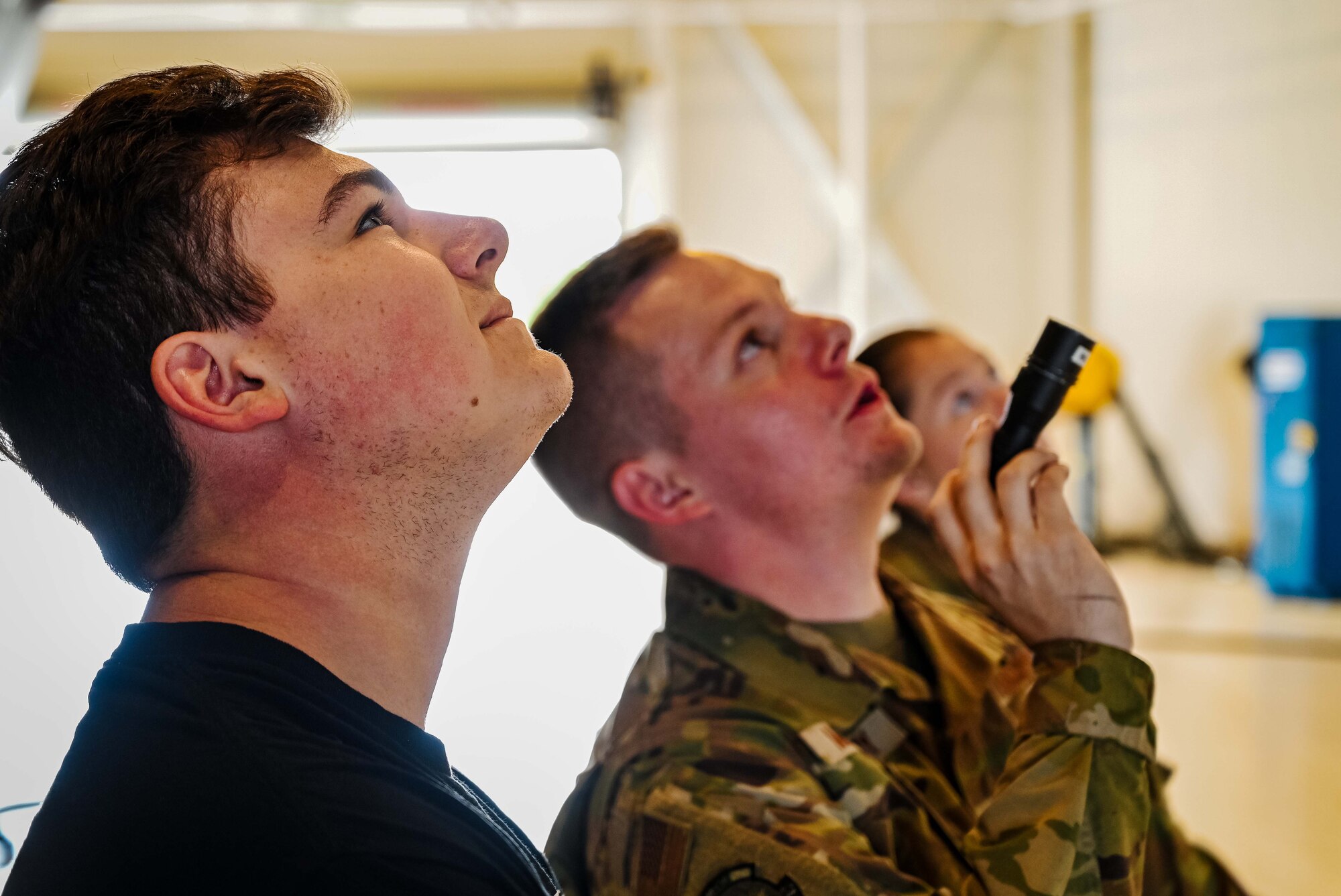 An Airman from the 305th Aircraft Maintenance Squadron discusses the engine workings of a C-17 Globemaster III aircraft to Formula Drift driver Branden Sorenson during a tour at Joint Base McGuire-Dix-Lakehurst on June 7, 2022. Drift team duo Branden and Amanda Sorensen visited JB MDL to interact with Airmen and learn about different Air Force career fields. Air Force Recruiting Service recently continued their 13-year partnership with the Formula Drift series. Throughout the 2022 Formula Drift circuit, the Air Force will serve as the primary sponsor for the Sorensen Motorsports team.