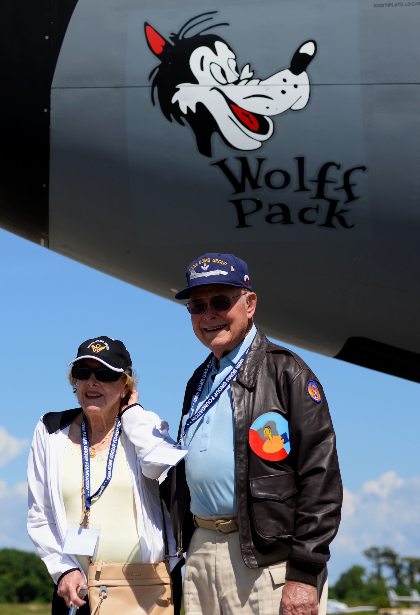 World War ll and 100th Bomb Group veteran Capt. (ret.) Robert “Bob” Wolff, right, poses with his wife Barb, underneath the Wolff Pack nose art on a KC-135 Stratotanker assigned to RAF Mildenhall, England, at a static display during the 100th Bomb Group reunion at Louis Armstrong New Orleans International Airport in New Orleans, La., Sept. 24, 2015. Bob was a B-17 Flying Fortress pilot while stationed at Thorpe Abbots, England, during World War ll. (U.S. Air Force photo by then-Senior Airman Victoria H. Taylor)