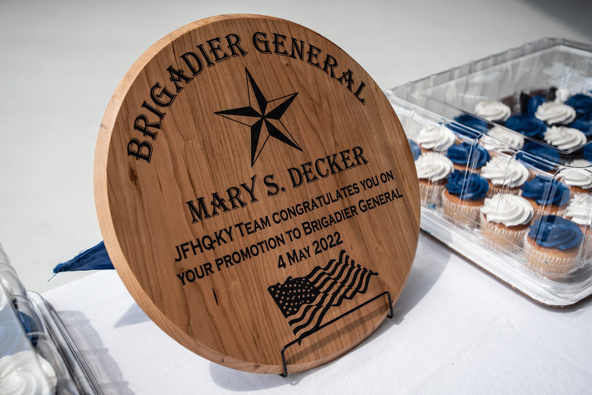 Mary S. Decker, chief of staff for Joint Force Headquarters — Air, Kentucky National Guard, is promoted to the rank of brigadier general during a ceremony at the Kentucky Air National Guard Base in Louisville, Ky., June 11, 2022. Decker joined the Air Force in 1987 as an airman basic. (U.S. Air National Guard photo by Dale Greer)