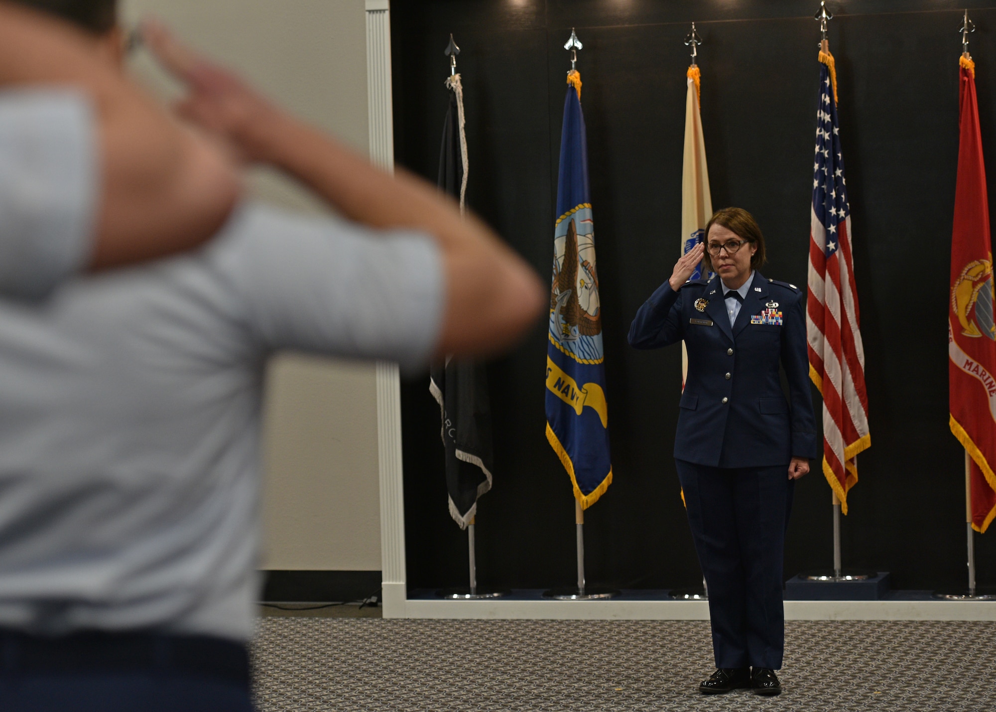 Members of the 17th Training Support Squadron salute U.S. Air Force Lt. Col. Renee Fontenot, 17th TRSS incoming commander, at the 17th TRSS change of command ceremony at the Powell Event Center, Goodfellow Air Force Base, Texas, June 17, 2022. Fontenot was previously stationed at the Pentagon in Washington, D.C. (U.S. Air Force photo by Senior Airman Ashley Thrash)