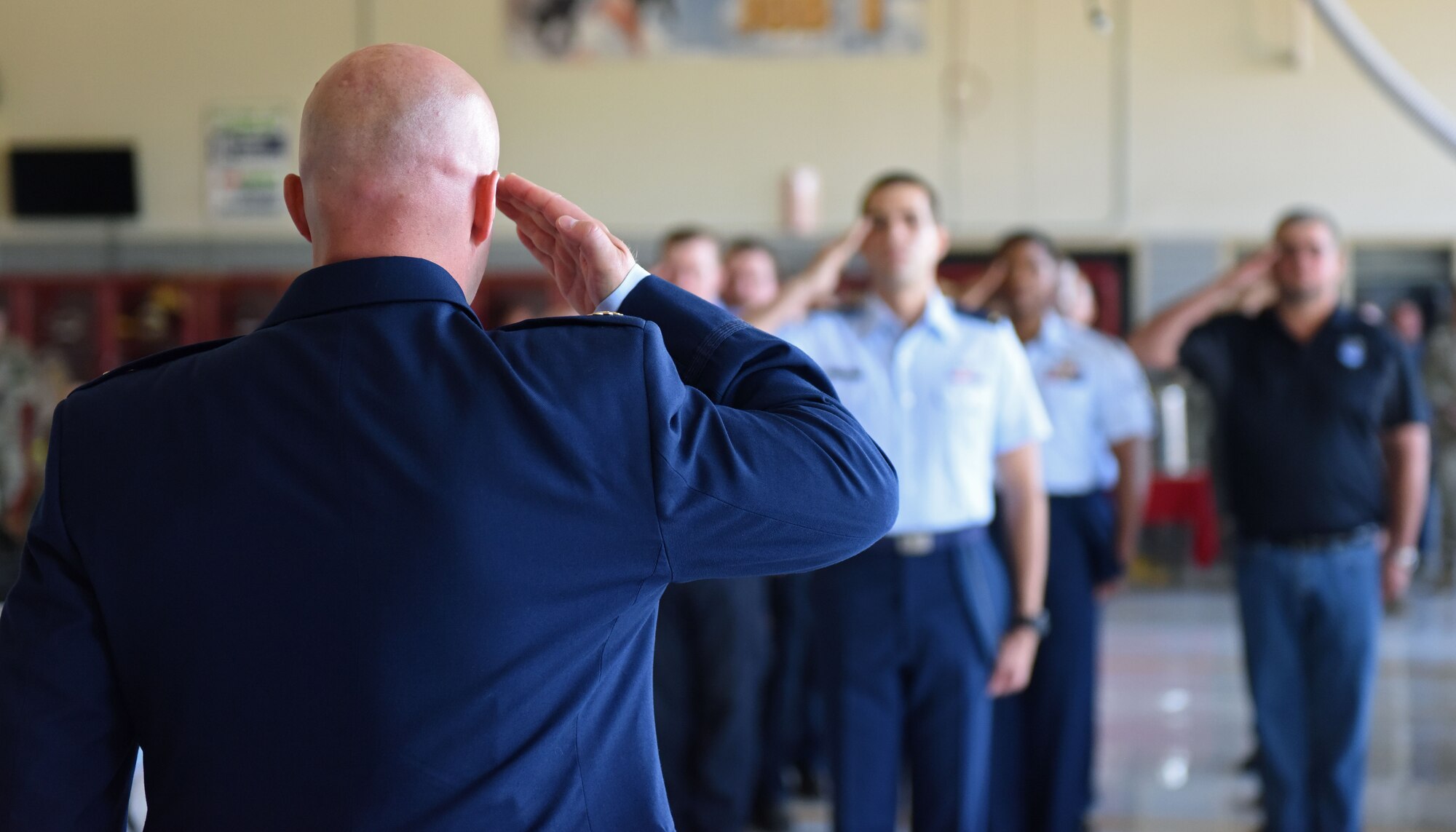 Members of the 17th Civil Engineer Squadron salute their incoming commander, U.S. Air Force Maj. Joshua Carroll, during the 17th CES change of command ceremony at Goodfellow Air Force Base, Texas, June 17, 2022. The mission for the 17th CES is to provide the quality facilities, infrastructure, and customer service necessary to produce fire protection and intelligence, surveillance, and reconnaissance professionals.