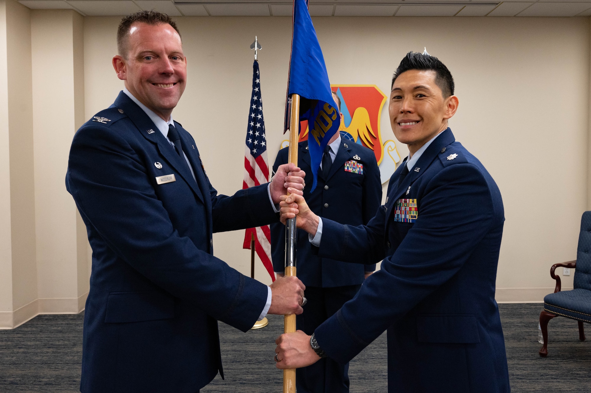 Airmen hold guidon