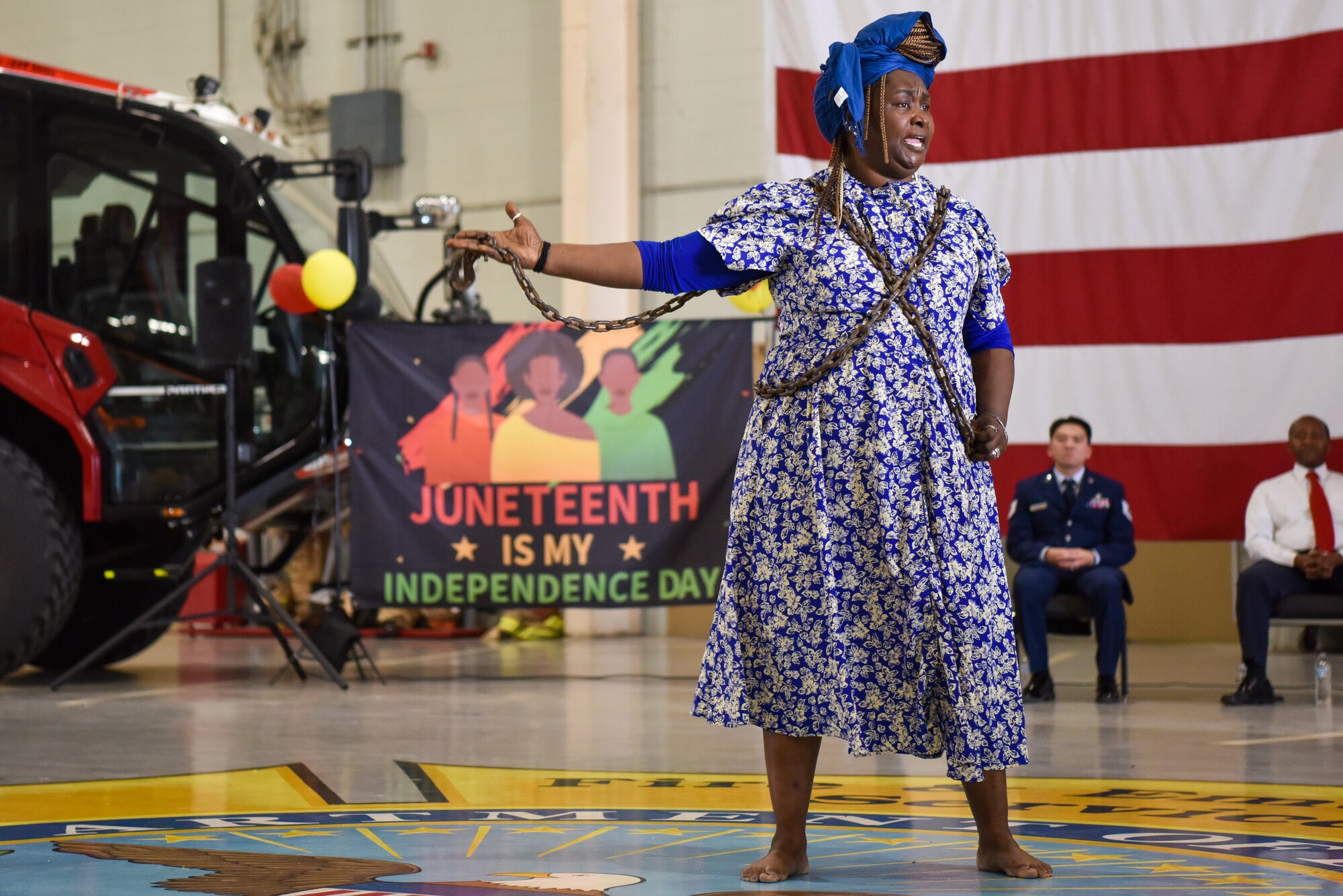 Alicia Wilder Walters, 17th Training Support Squadron instructor, performs an interactive spoken word rendition during the Juneteenth commemoration ceremony at Goodfellow Air Force Base, Texas, June 16, 2022. The purpose of the ceremony was to educate and celebrate resilience, resistance and liberation. (U.S. Air Force photo by Staff Sgt. Jermaine Ayers)