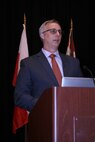 Captain Christopher Hall, USN, Chief of Staff, NMIO, presenting the keynote address at the Law Enforcement Intelligence Unit/International Association of Law Enforcement Intelligence Analysts (LEIU/IALEA) annual training event in Dallas, TX, April 2022