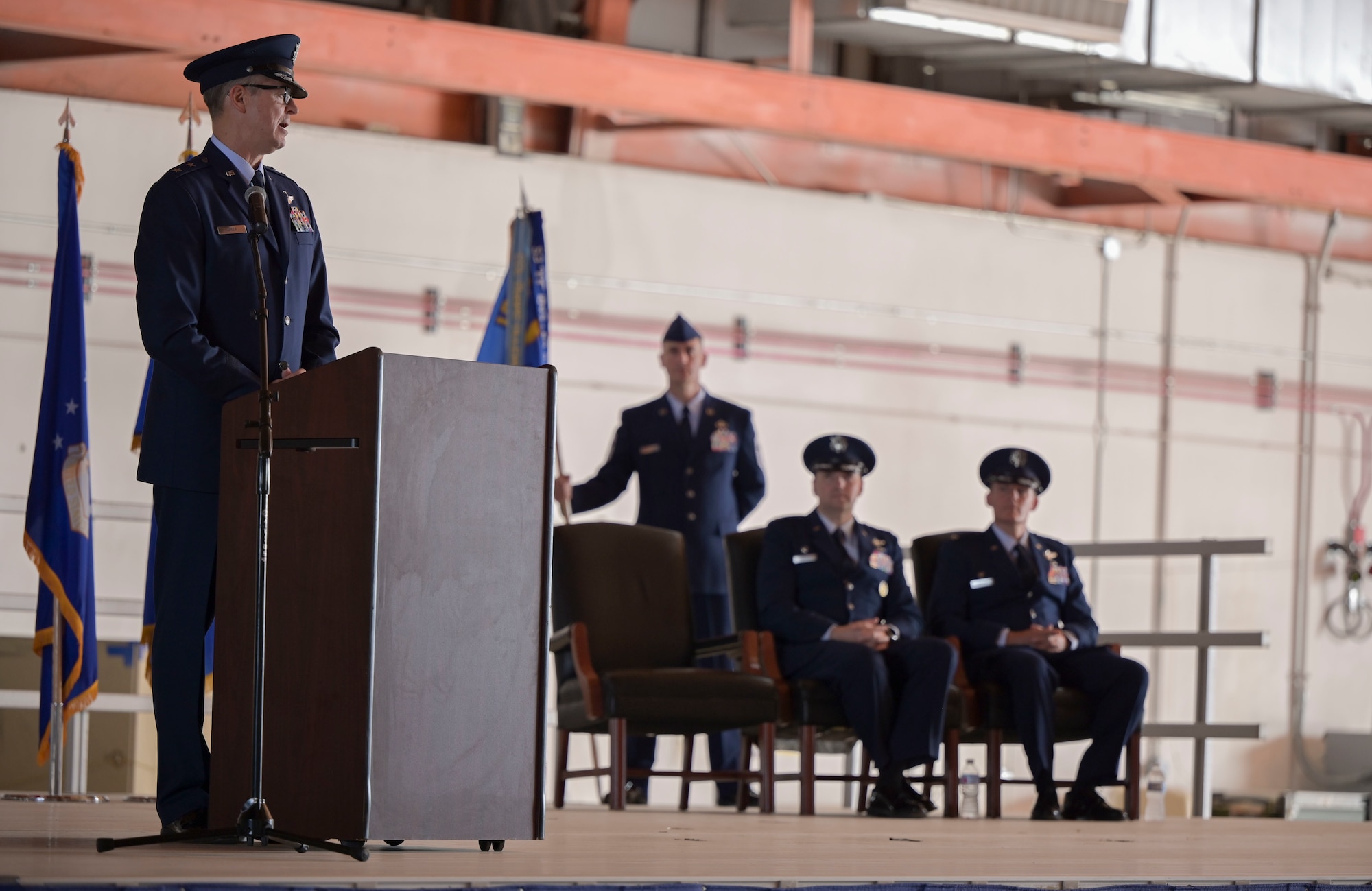 Maj. Gen. Craig D. Wills, 19th Air Force commander, provides remarks during the 49th Wing change of command ceremony June 17, 2022, on Holloman Air Force Base, New Mexico. Col. Ryan P. Keeney relinquished command of the wing to Col. Justin B. Spears after two years of leading the U.S. Air Force’s premier F-16 Viper and MQ-9 Reaper aircrew training base. (U.S. Air Force photo by Airman 1st Class Antonio Salfran)