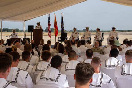 Sailors sit and attend the establishment ceremony for Helicopter Maritime Strike Squadron (HSM) 79 detachment, Rota, Spain