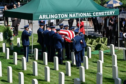 The Air Force Honor Guard carries the casket of Brig. Gen. Charles E. McGee during his funeral at Arlington National Cemetery, Arlington, Va., June 17, 2022. McGee, a Tuskegee Airman, died Jan. 16, 2022 at the age of 102. He served 30 years during World War II, the Korean War and the Vietnam War. (U.S. Air Force photo by Eric Dietrich)