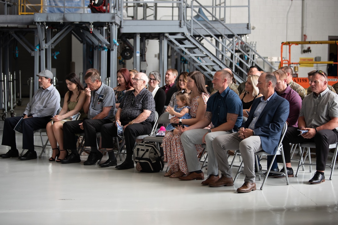 Family and friends attend a ceremony promoting Mary S. Decker, chief of staff for Joint Force Headquarters — Air, Kentucky National Guard, to the rank of brigadier general June 11, 2022, at the Kentucky Air National Guard Base in Louisville, Ky. Decker joined the Air Force in 1987 as an airman basic. (U.S. Air National Guard photo by Dale Greer)