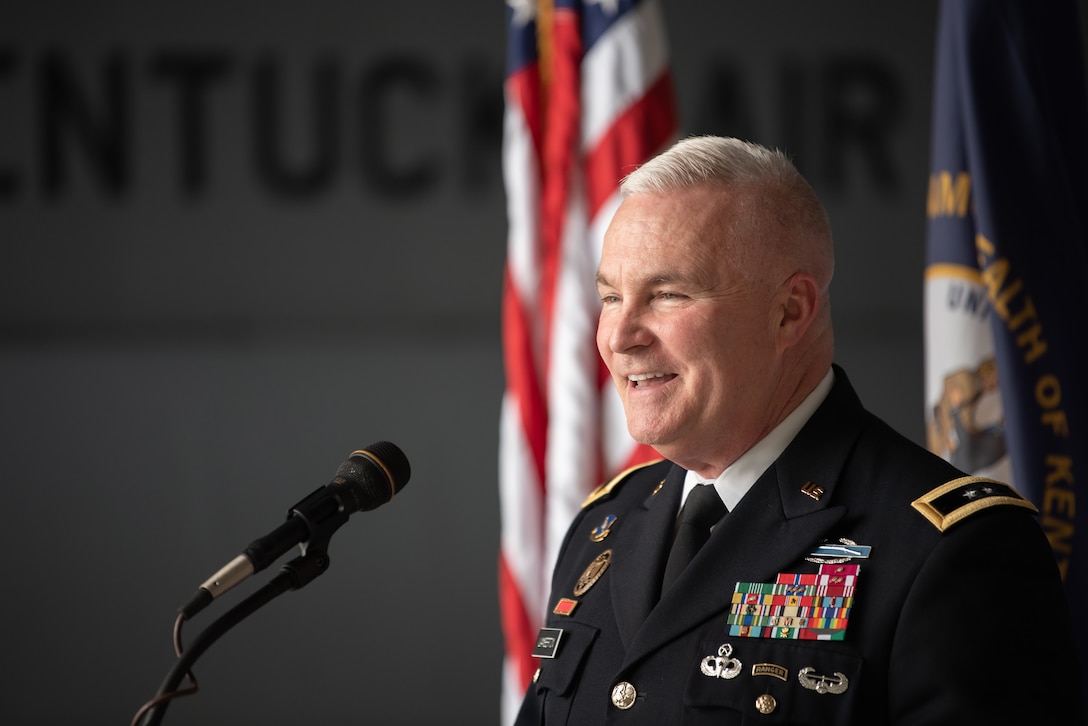 The adjutant general of the Kentucky National Guard, Army Maj. Gen. Haldane B. Lamberton, speaks to the audience during a ceremony to promote Mary S. Decker, chief of staff for Joint Force Headquarters — Air, Kentucky National Guard, to the rank of brigadier general at the Kentucky Air National Guard Base in Louisville, Ky., June 11, 2022. Decker joined the Air Force in 1987 as an airman basic. (U.S. Air National Guard photo by Dale Greer)