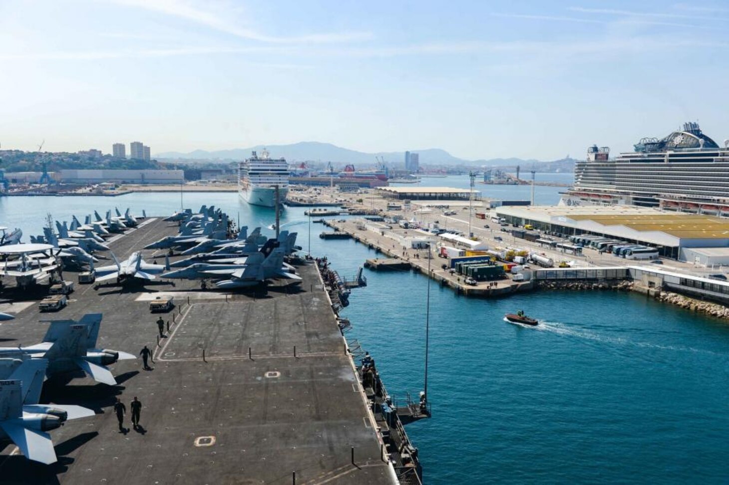(June 18, 2022) USS Harry S. Truman (CVN 75) pulls into Marseille, France for a scheduled port visit, June 18, 2022. The Harry S. Truman Carrier Strike Group is on a scheduled deployment in the U.S. Naval Forces Europe area of operations, employed by U.S. Sixth Fleet to defend U.S., allied and partner interests.