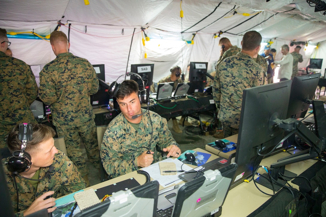 U.S. Marines with Marine Air Control Squadron 4, Marine Air Control Group (MACG) 18, support command and control of aircraft at Andersen Air Force Base, Guam, June 13, 2022, in support of Valiant Shield 2022. Exercise Valiant Shield gives units like MACG-18 the opportunity to integrate with forces across the Indo-Pacific to train in successful employment and operations that demonstrate the strength and versatility of the Joint Force. (U.S. Marine Corps photo by Cpl. Tyler Harmon)