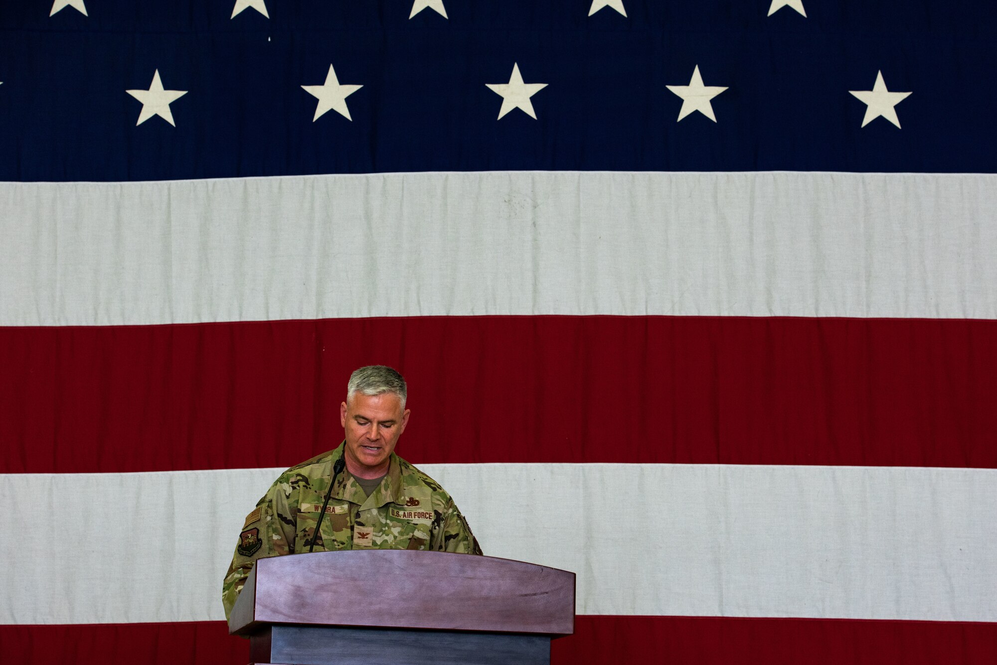 Col. Todd Wydra, 51st Maintenance Group incoming commander, delivers his acceptance speech as the newly-appointed MXG commander at Osan Air Base, Republic of Korea, June 17, 2022.