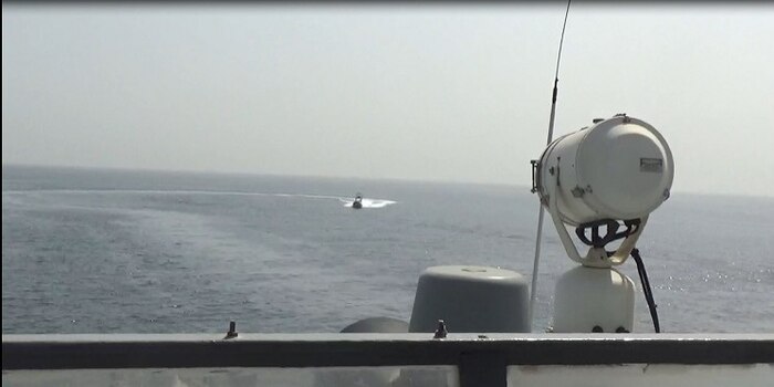 220620-N-NO146-1002 STRAIT OF HORMUZ (June 20, 2022) A video screenshot of Iran’s Islamic Revolutionary Guard Corps Navy (IRGCN) operating in an unsafe and unprofessional manner in close proximity to patrol coastal ship USS Sirocco (PC 6) and expeditionary fast transport USNS Choctaw County (T-EPF 2) in the Strait of Hormuz, June 20.