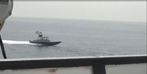 220620-N-NO146-1003 STRAIT OF HORMUZ (June 20, 2022) A video screenshot of Iran’s Islamic Revolutionary Guard Corps Navy (IRGCN) operating in an unsafe and unprofessional manner in close proximity to patrol coastal ship USS Sirocco (PC 6) and expeditionary fast transport USNS Choctaw County (T-EPF 2) in the Strait of Hormuz, June 20.