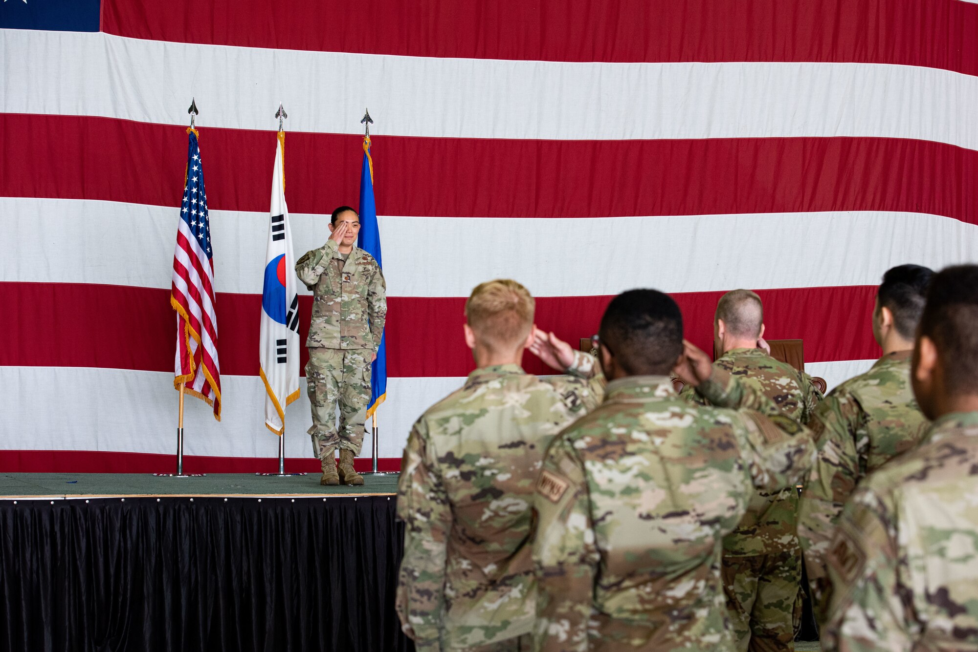 Maj. Kelliane Matsuoka, 36th Fighter Generation Squadron commander, renders her first salute to the squadron as their new commander