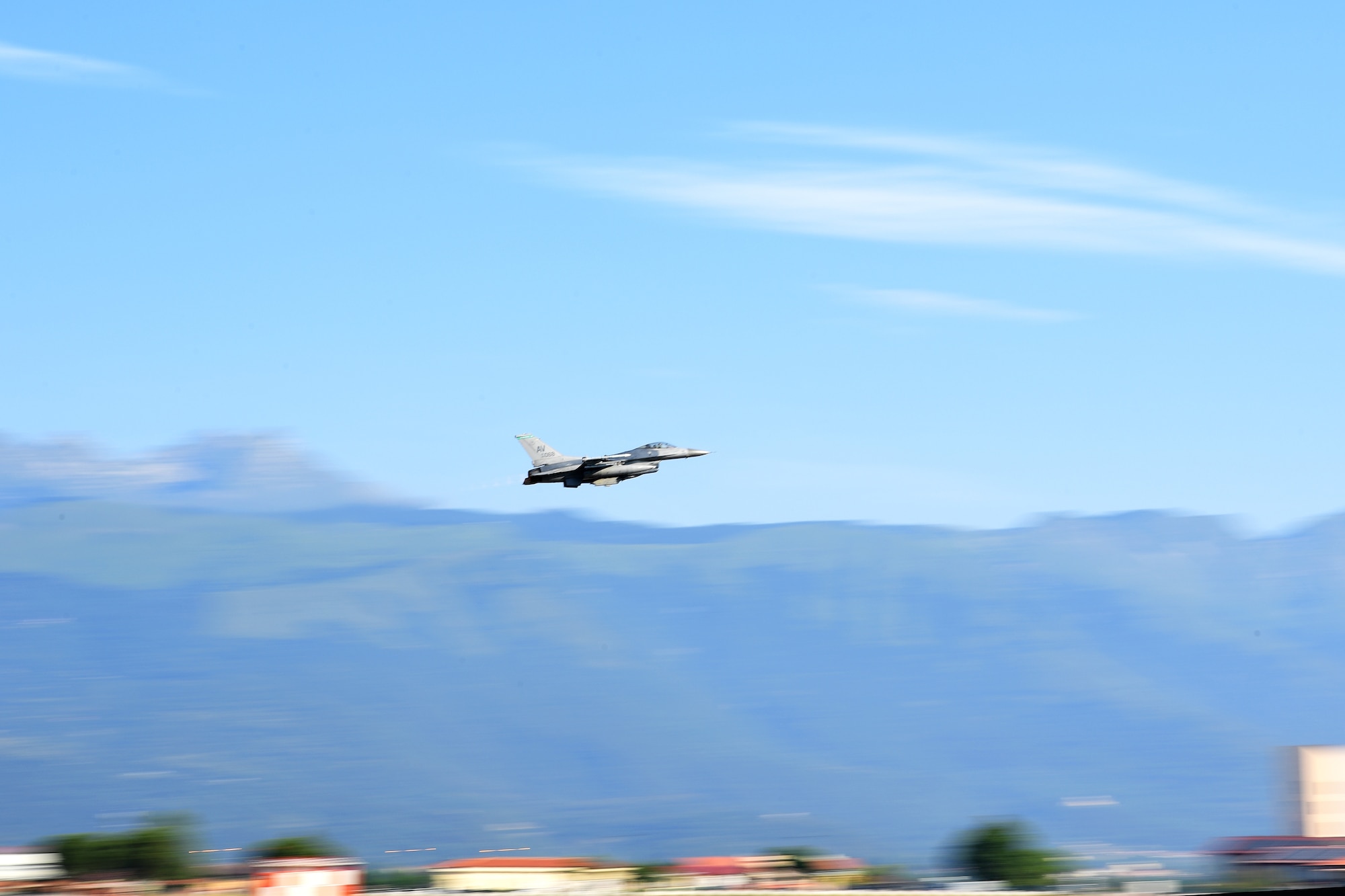 A U.S. Air Force F-16 Fighting Falcon from the 555th Fighter Squadron takes off from Aviano Air Base, Italy, July 16, 2022. The 555th FS provides combat airpower on demand to U.S. and NATO Combatant Commanders as well as the National Command Authority in order to meet National Security objectives. (U.S. Air Force photo by Senior Airman Noah Sudolcan)