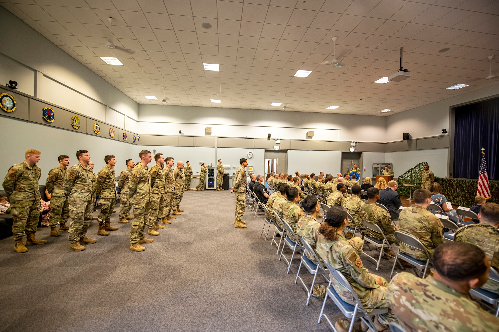 Col. Jon T. Hannah, rear right, speaks during a change of command ceremony at RAF Croughton, England, June 16, 2022. The ceremony is a military tradition that represents a formal transfer of a unit’s authority from one commander to another. (U.S. Air Force photo by Staff Sgt. Eugene Oliver)