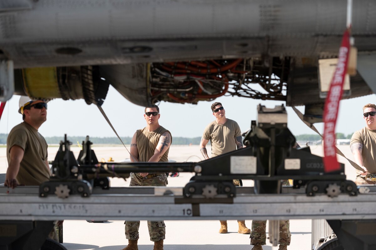 Airmen from the Idaho Air National Guard’s 124th Maintenance Group replace an engine on the flight line at the Combat Readiness Training Center, Alpena, MI, June 15, 2022.
