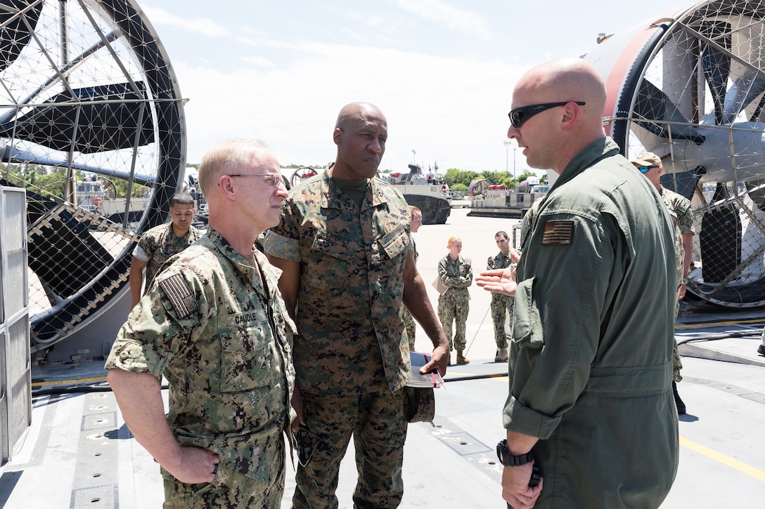 U.S. Marine Corps Lt. Gen. Michael E. Langley, the commanding general of Fleet Marine Force, Atlantic, Marine Forces Command, Marine Forces Northern Command, and Adm. Daryl L. Caudle, commander of U.S. Fleet Forces Command, visited ACU 4 for inspection of and familiarization with the new SSC amphibious watercraft assigned to the unit and to foster advocacy for expeditionary warfare initiatives in support of naval integration. ACU 4 provides fast, over-the-horizon movement from ship-to-shore of service members and equipment. (U.S. Marine Corps photo by Casey Price)